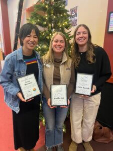 Tahoe Truckee Community Leaders honored by the Community Collaborative of Tahoe Truckee (standing in front of holiday decorations)